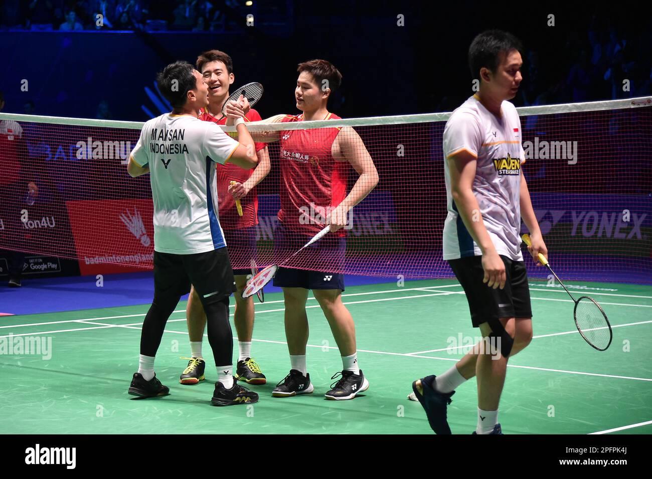 Indonesia's Mohammad Ahsan, left, shakes hands with China's Liang Wei ...