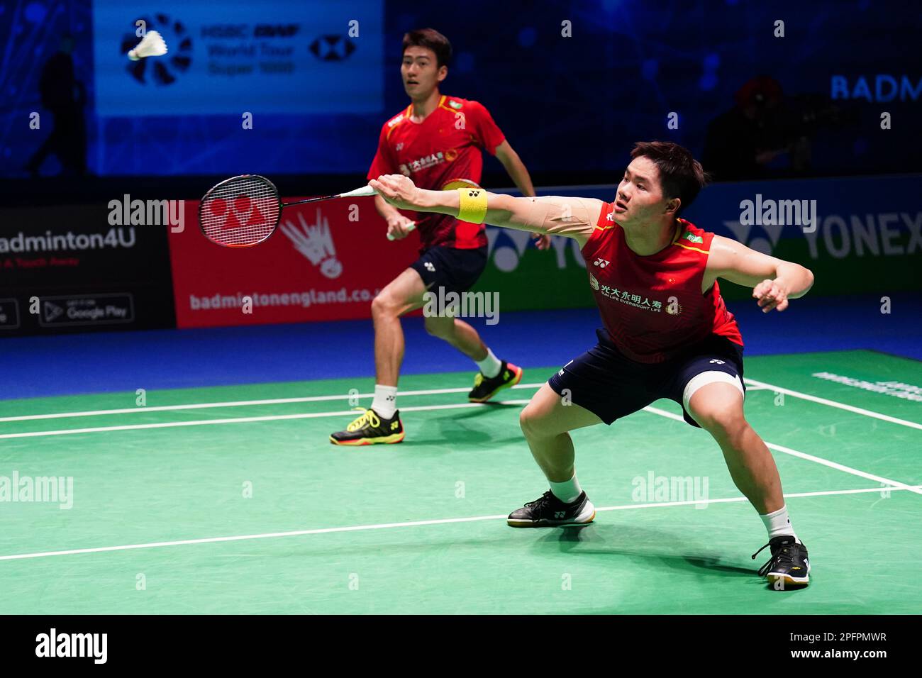 China's Liang Wei Keng (right) and Wang Chang in action against ...