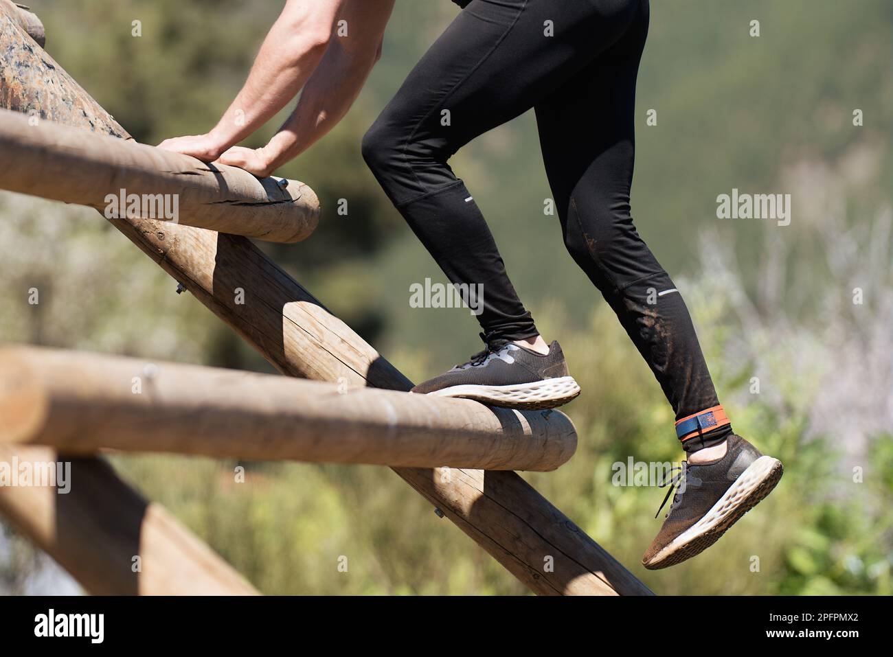 Mud race runners, obstacles during extreme obstacle race Stock Photo ...
