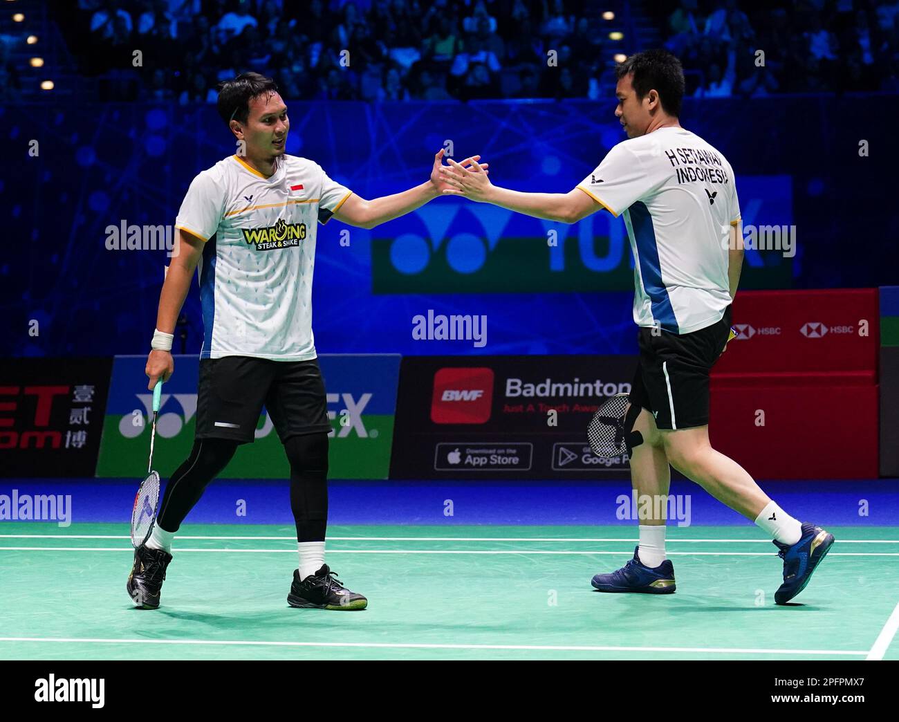 Indonesia's Mohammad Ahsan (left) and Hendra Setiawan in action against ...