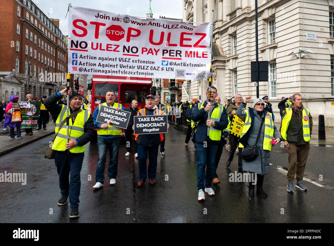 Westminster, London, UK. 18th Mar, 2023. Protesters are marching in Westminster in protest against the planned expansion of the Ultra Low Emission Zone (ULEZ) throughout all London boroughs from 29 August 2023. They believe that it is a tax on the poorer drivers with older cars. Stock Photo