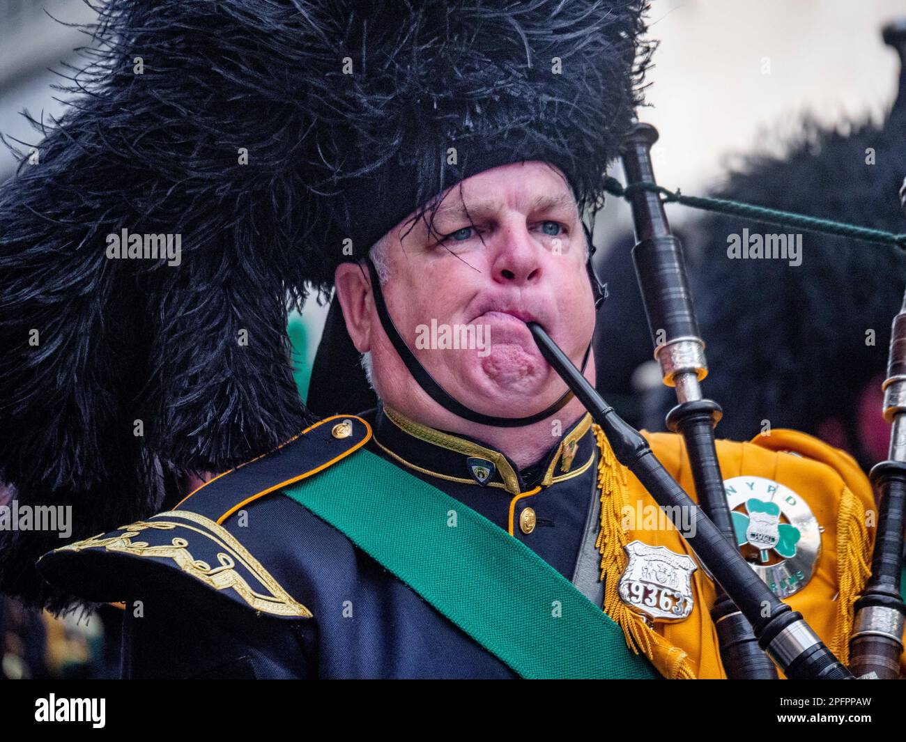 New York, New York, USA. 17th Mar, 2023. Bagpiper playing the pipes ...