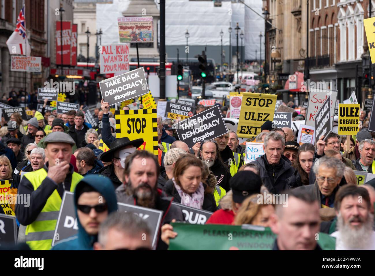 Westminster, London, UK. 18th Mar, 2023. Protesters are marching in Westminster in protest against the planned expansion of the Ultra Low Emission Zone (ULEZ) throughout all London boroughs from 29 August 2023. They believe that it is a tax on the poorer drivers with older cars Stock Photo