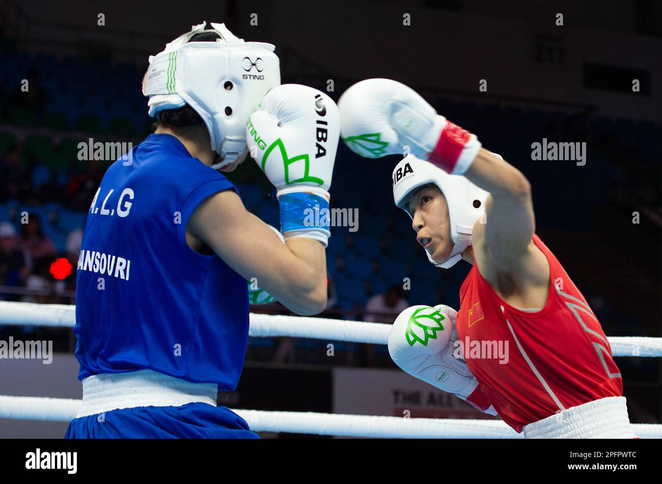 New Delhi. 18th Mar, 2023. China's Hu Meiyi (R) competes with Mansouri Fatiha of Algeria during elite women's 45-48kg minimum preliminary match of the IBA World Women's Boxing Championships 2023 in New Delhi, March 18, 2023. Credit: Javed Dar/Xinhua/Alamy Live News Stock Photo