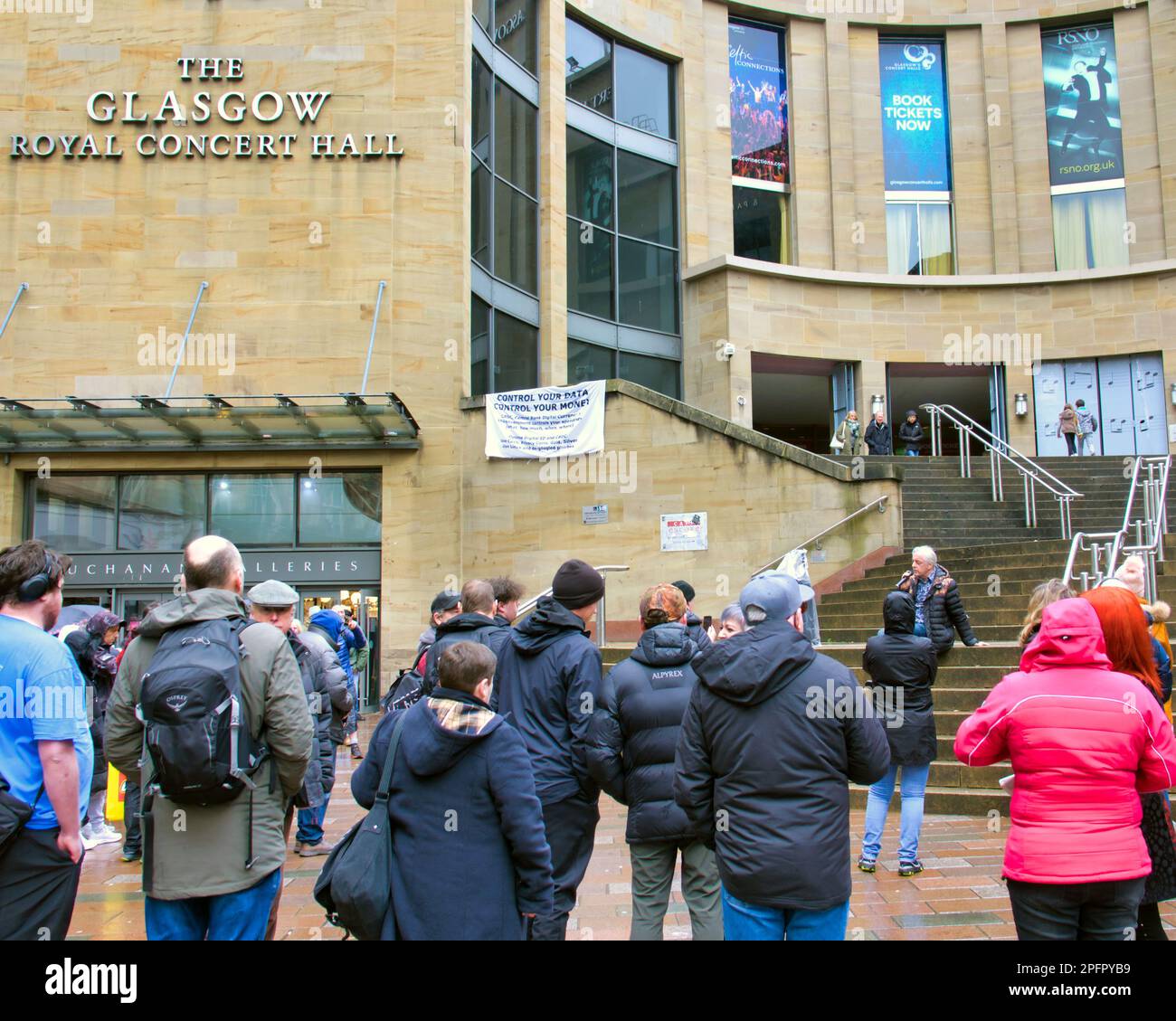 Glasgow, Scotland, UK 18th March, 2023. Central bank digital currency (CBDC) protest on the democracy spot of Glasgow, the Buchanan steps of the royal concert hall with the donald dewar statue, saw a former councillor among the speakers against the big brother currency grab. Credit Gerard Ferry/Alamy Live News Stock Photo