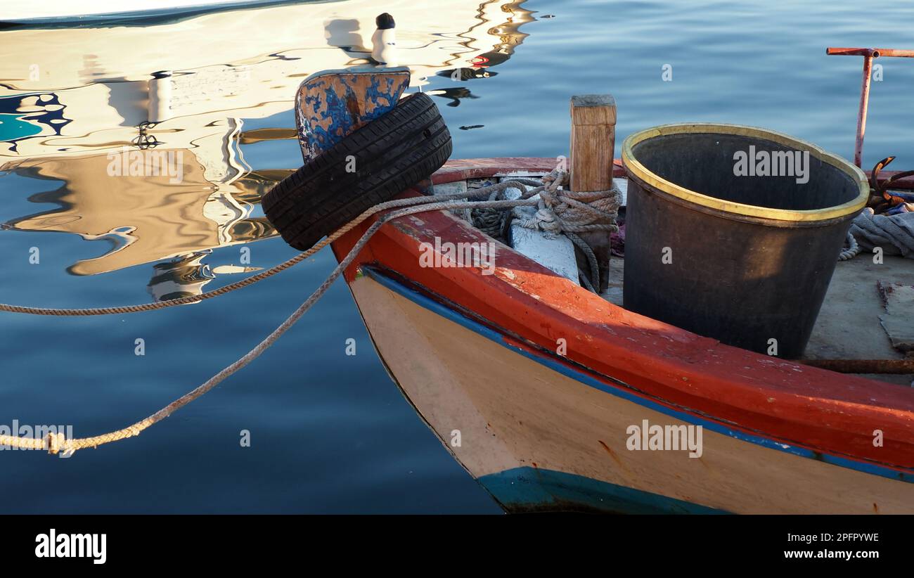 boatreflection on harbor Stock Photo