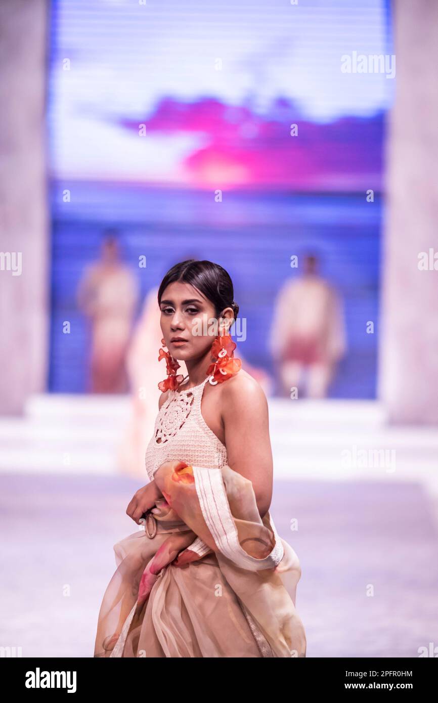 Dhaka, Bangladesh. 17th Mar, 2023. A model walks the runway at the