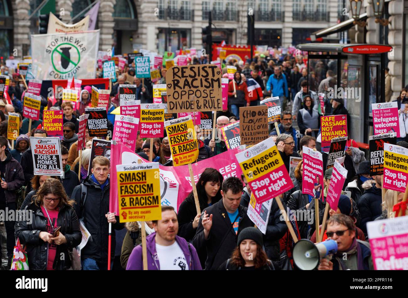 London, UK. 18th Mar, 2023. Resist Racism March. People march through Central London to oppose plans by Home Secretary, Suella Braverman to send migrants and Refugees to Rwanda. They oppose the Governments Immigration Policy. Credit: Mark Thomas/Alamy Live News Stock Photo
