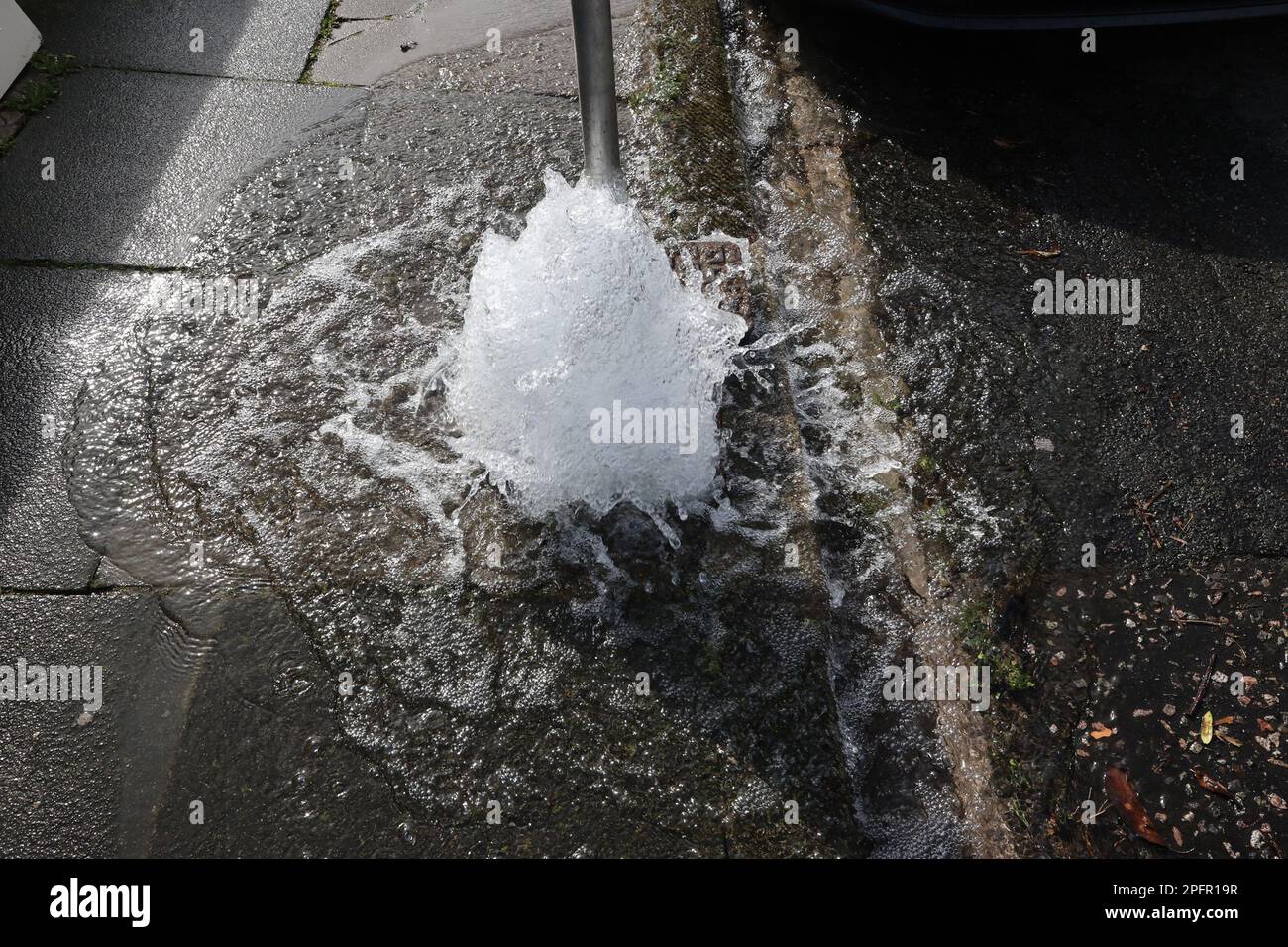 A burst water pipe in Brighton, UK Stock Photo