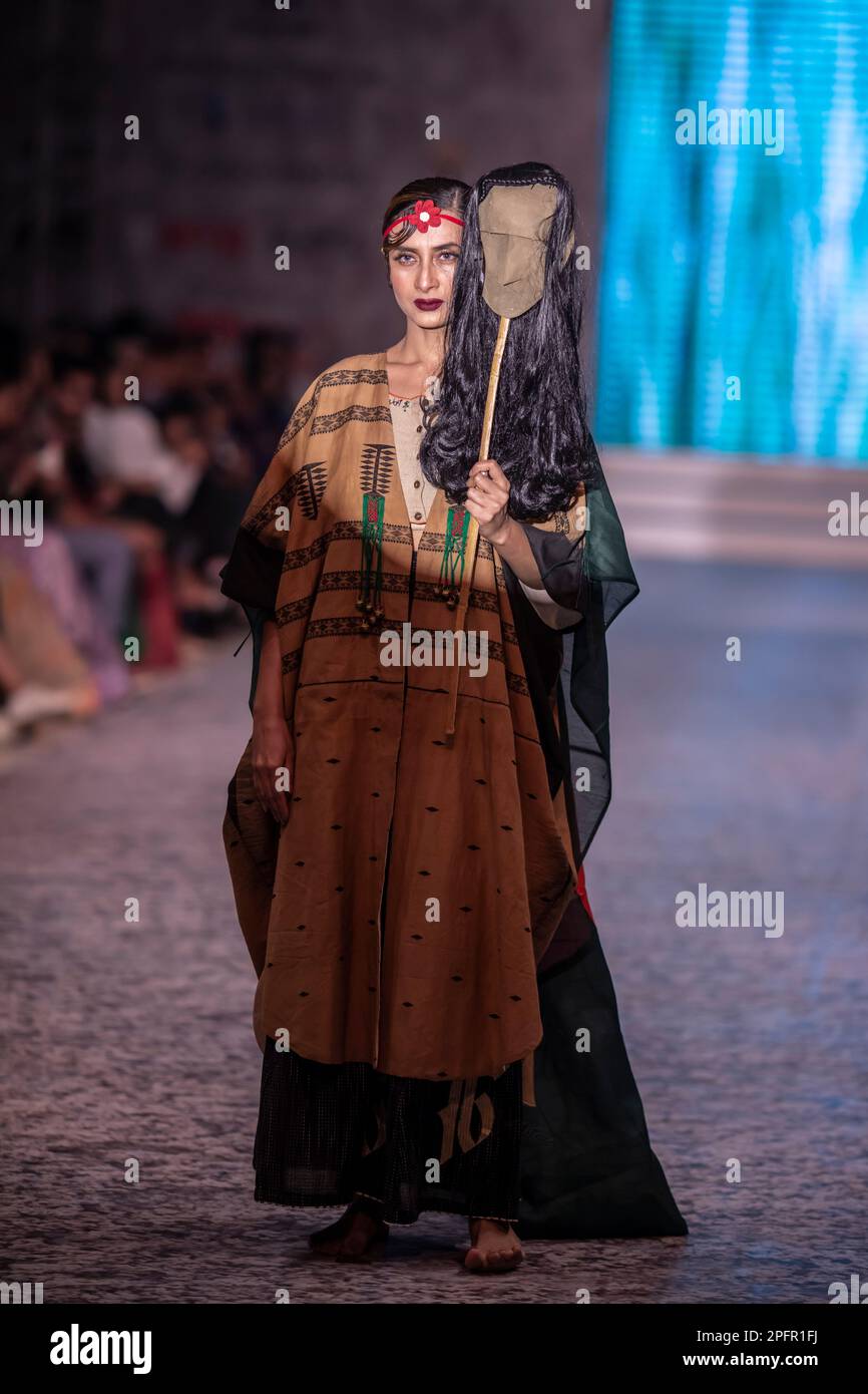 Dhaka, Bangladesh. 17th Mar, 2023. A model walks the runway at the