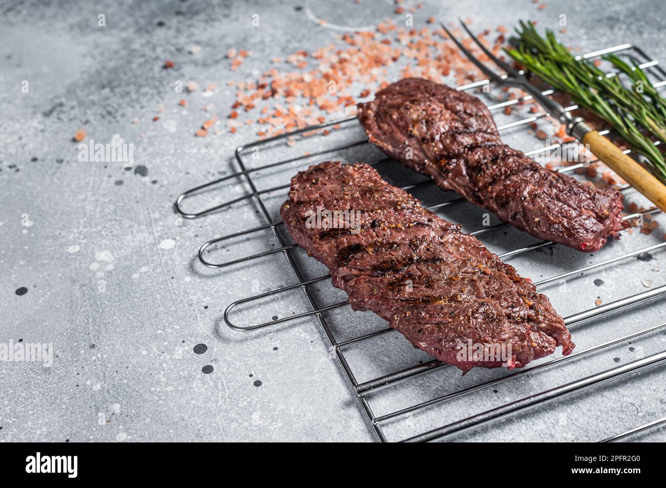 Grilled Flap steak flank cut and Machete skirt steak on grill with