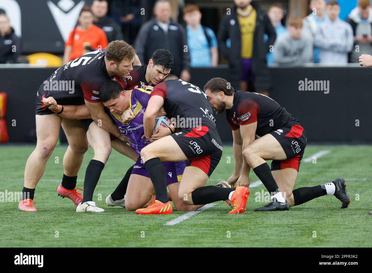 Mitch Clark of Newcastle Thunder is tackled during the BETFRED Championship match between Newcastle Thunder and London Broncos at Kingston Park, Newcastle on Saturday 18th March 2023. (Photo: Chris Lishman | MI News) Credit: MI News & Sport /Alamy Live News Stock Photo