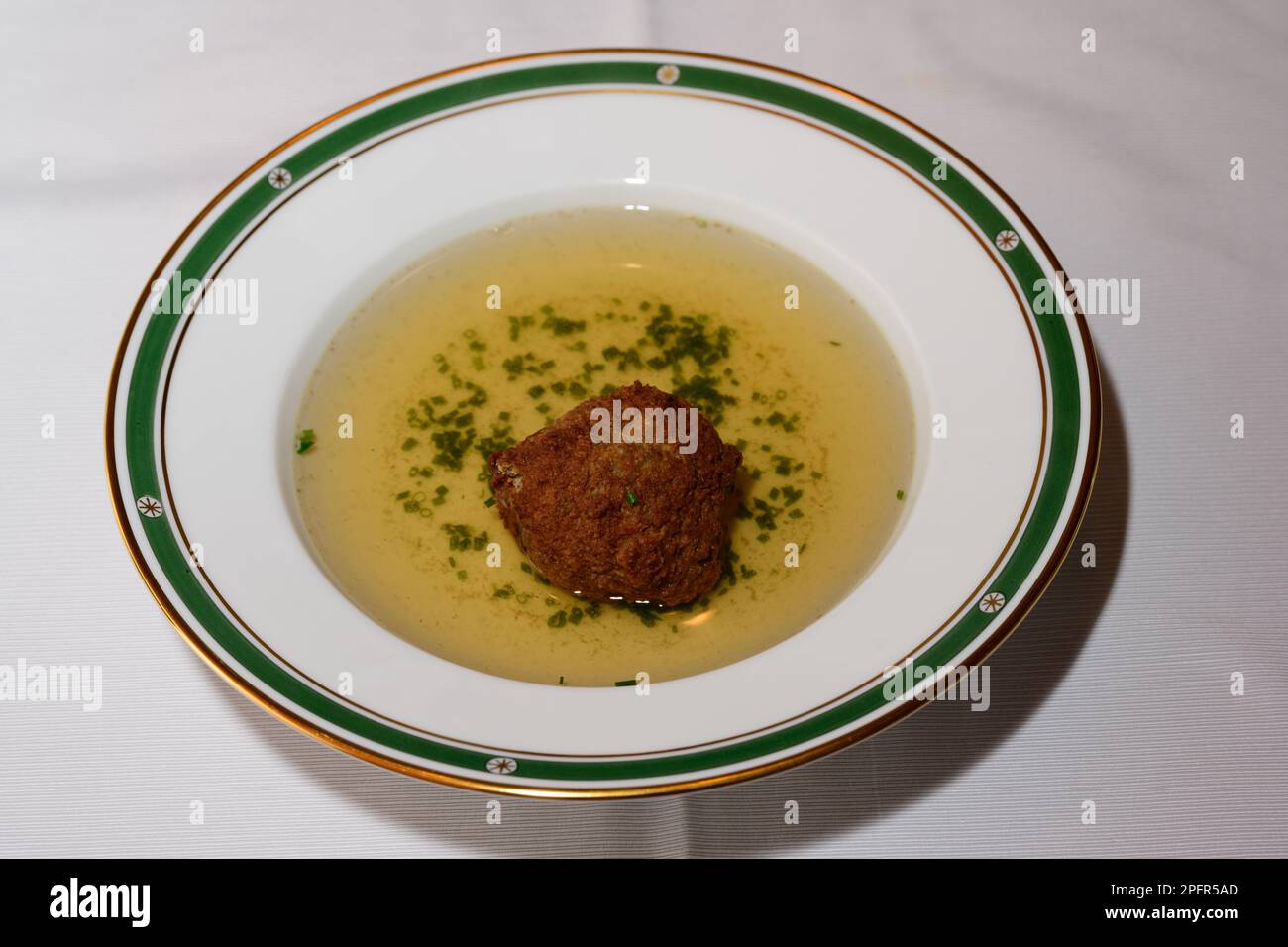 Liver Dumpling Soup or Leberknoedelsuppe, Austrian Beef Broth Stock Photo