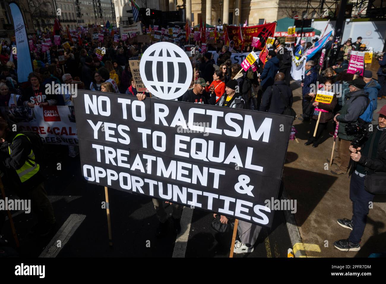 London, UK. 18 March 2023. People with a large sign outside the BBC ...