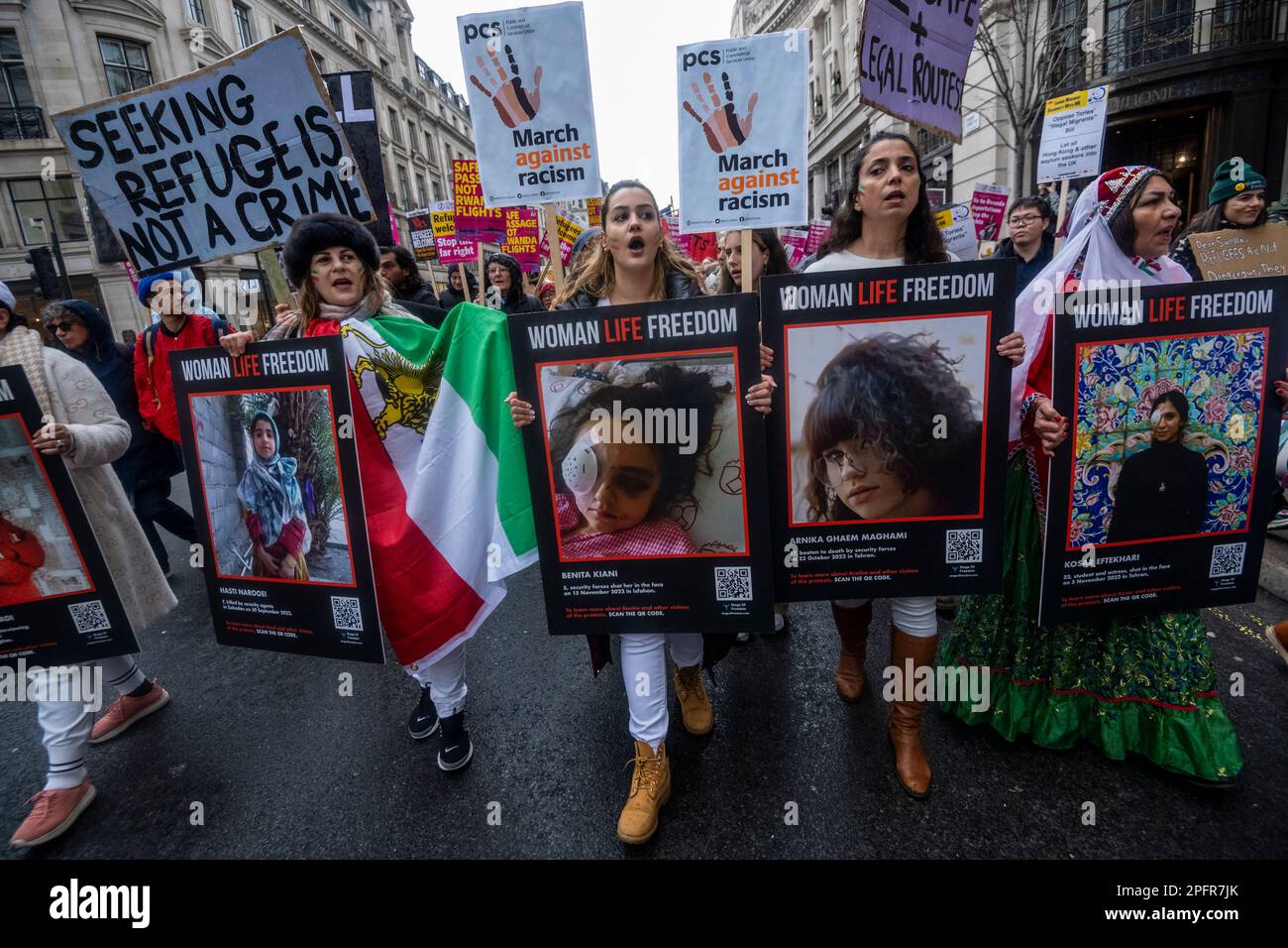 London, UK.  18 March 2023.  British Iranian women in Regent Street take part in a 'Resist Racism' demonstration, marching from Portland Place to a rally in Westminster, as part of an international day of action to mark United Nations anti-racism day  Credit: Stephen Chung / Alamy Live News Stock Photo