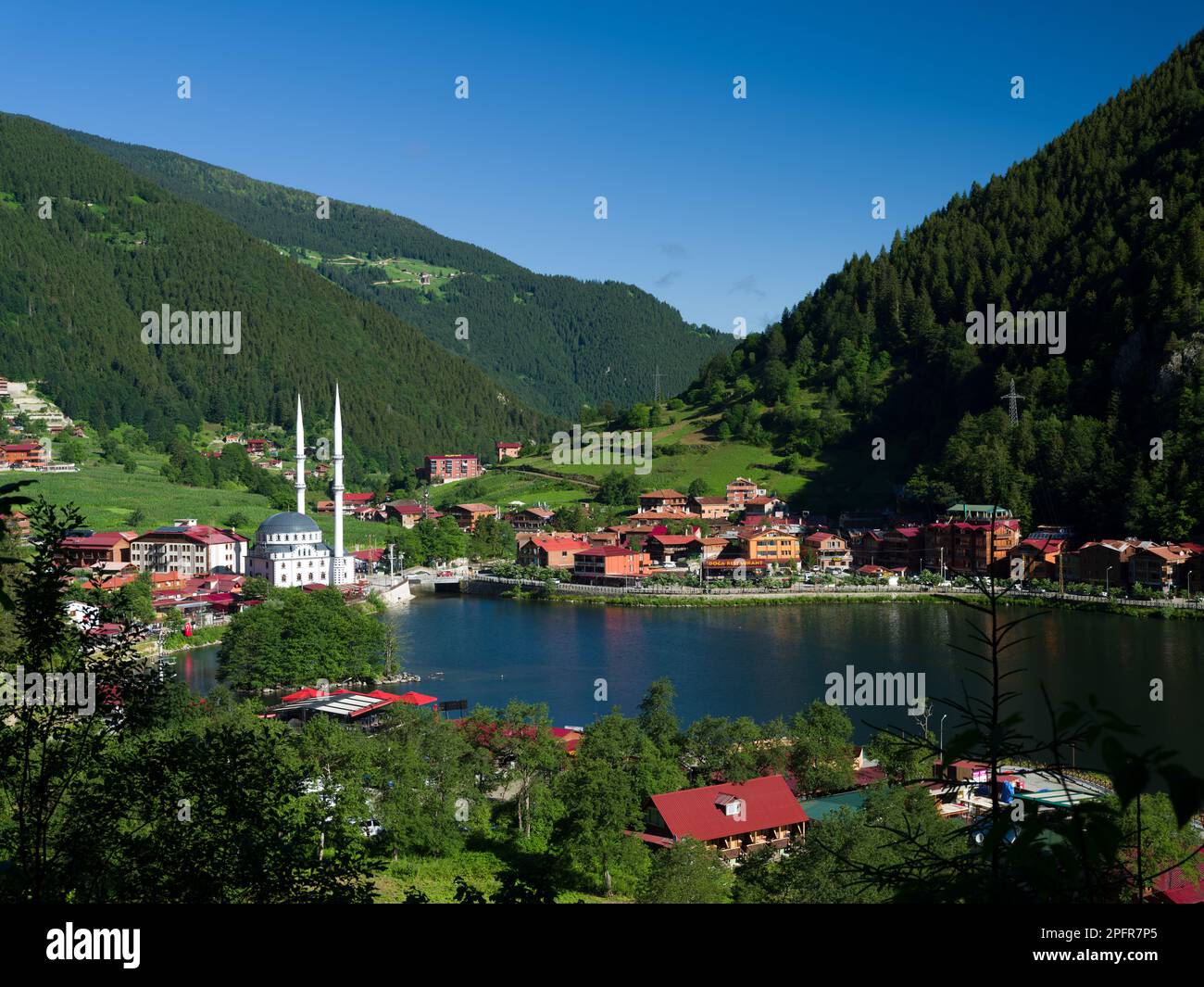 Turkey's famous tourist mountain lake. Long lake (Uzungöl) view from the top of the view in the morning light. Trabzon,Turkey Stock Photo