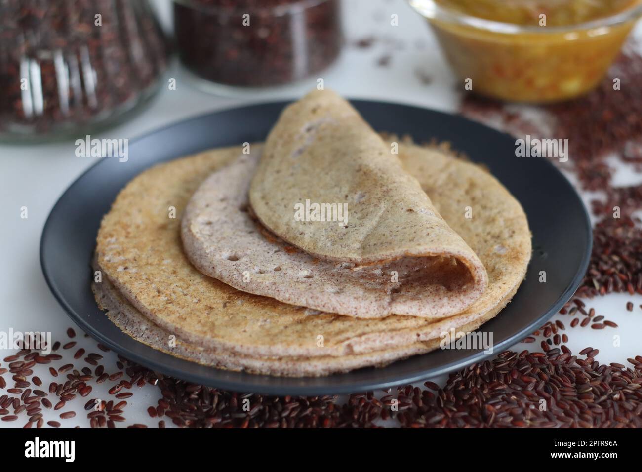 Soft spongy pancakes made of a fermented batter of poongar rice and