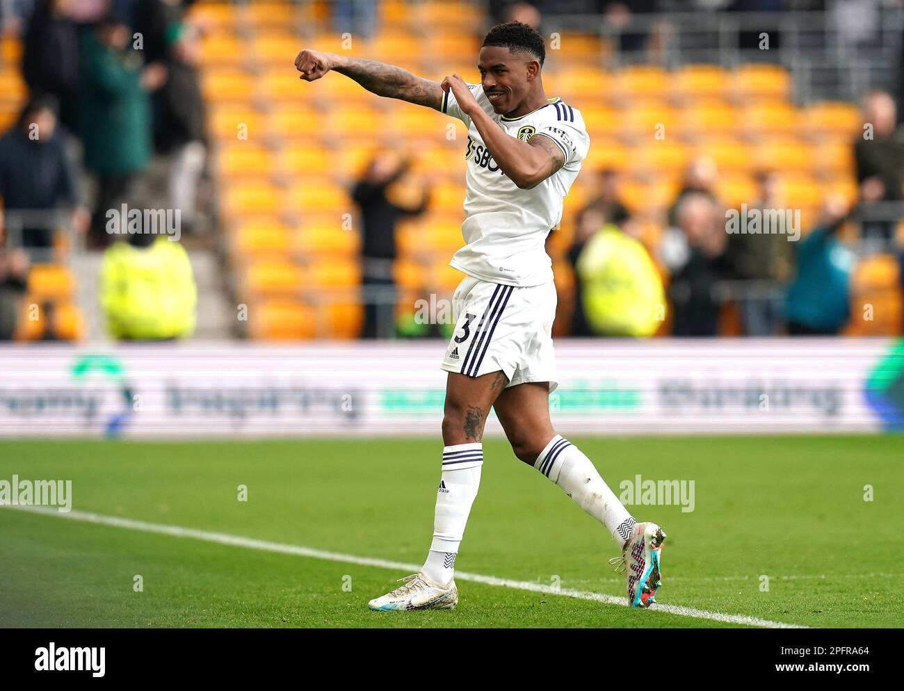 Leeds United's Junior Firpo celebrates after the final whistle in the Premier League match at Molineux Stadium, Wolverhampton. Picture date: Saturday March 18, 2023. Stock Photo