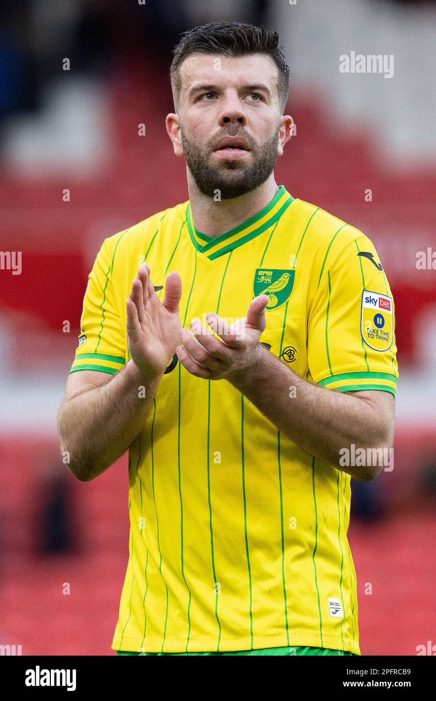 Grant Hanley #5 of Norwich City applauds the travelling fans after the Sky Bet Championship match Stoke City vs Norwich City at Bet365 Stadium, Stoke-on-Trent, United Kingdom, 18th March 2023  (Photo by Phil Bryan/News Images) Stock Photo