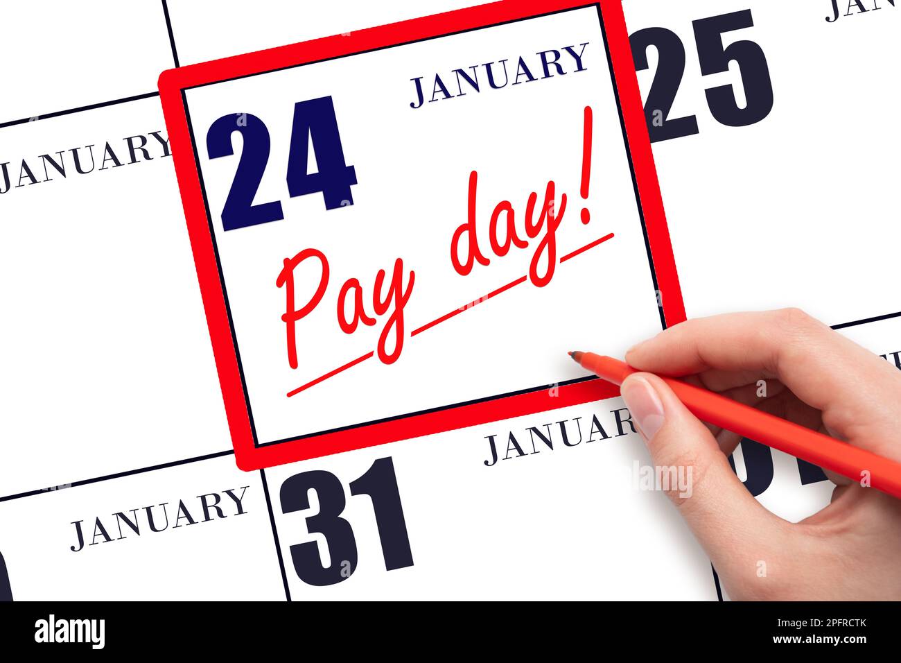 24th day of January. Hand writing text PAY DATE on calendar date January 24 and underline it. Payment due date.  Reminder concept of payment. Winter m Stock Photo
