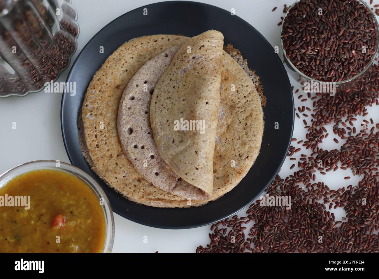 Soft spongy pancakes made of a fermented batter of poongar rice and