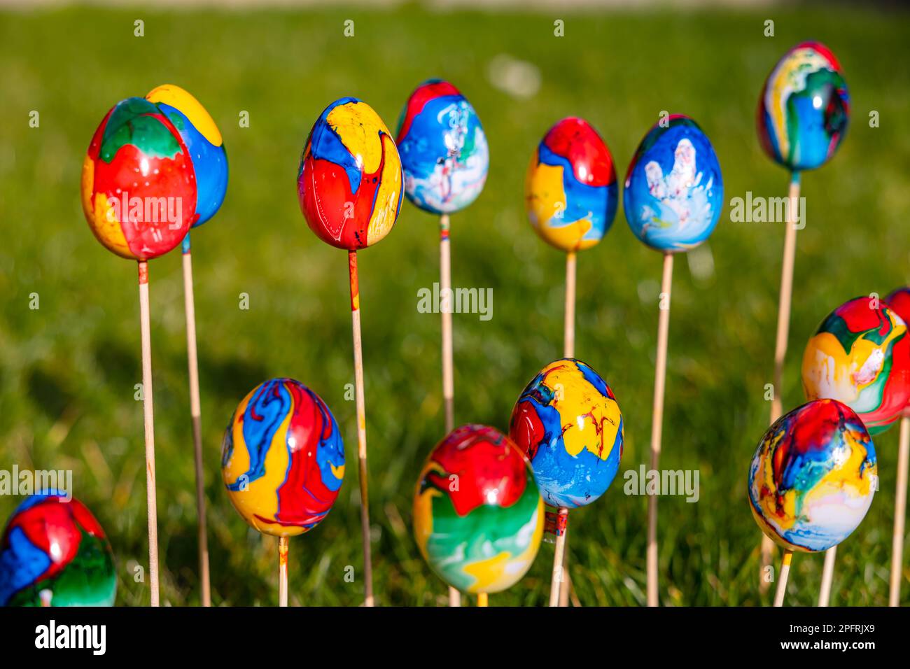 Poppy colorful Easter eggs with different colors uniquely hand-painted Stock Photo