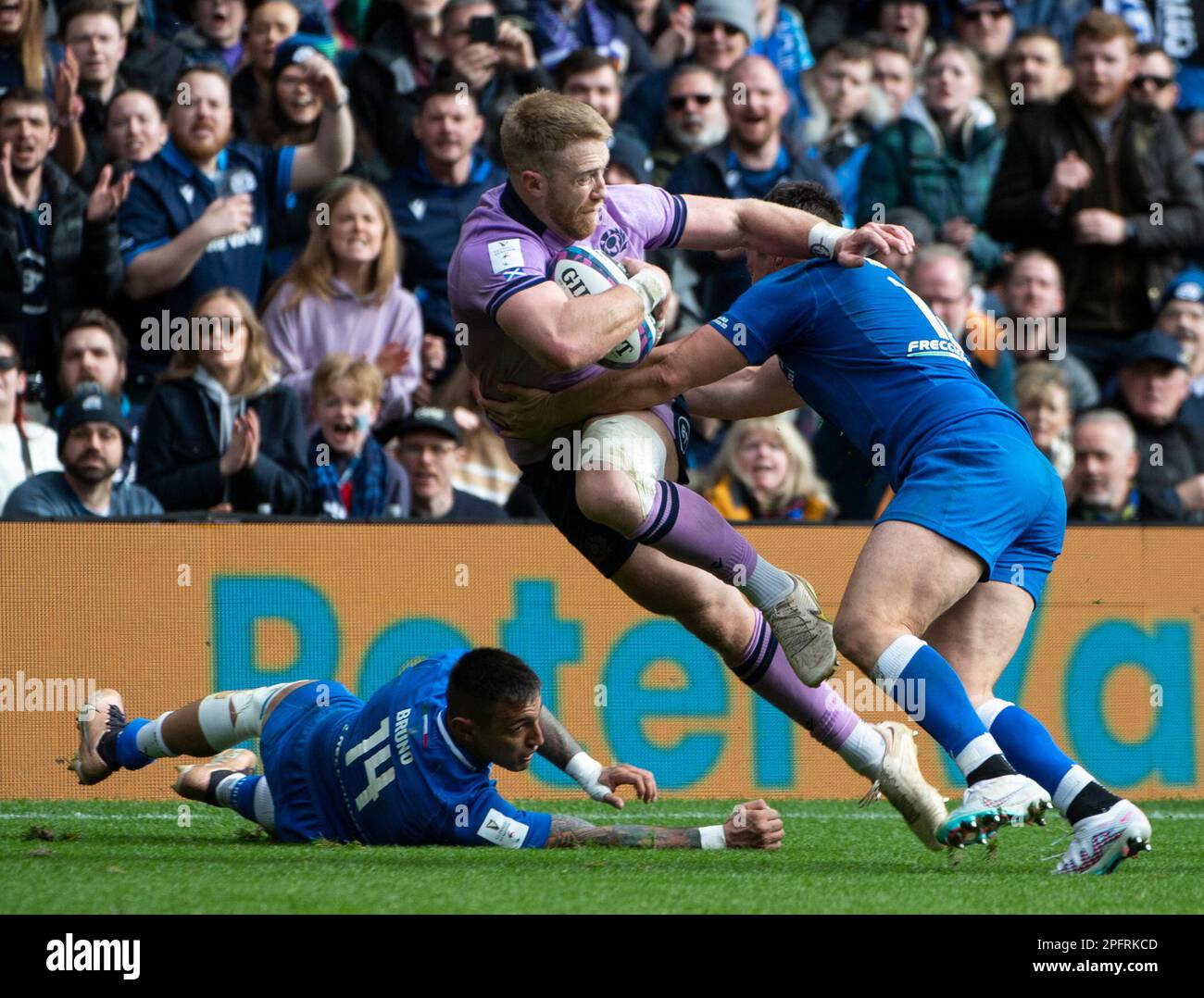 Edinburgh, UK. 18th Mar, 2023. EDINBURGH, SCOTLAND - MARCH 18: Scotland Centre, Kyle Steyn, is tackled during the Six Nations Rugby match between Scotland and Italy at Murrayfield Stadium on March 12, 2023 in Edinburgh, United Kingdom. ( Credit: Ian Jacobs/Alamy Live News Stock Photo