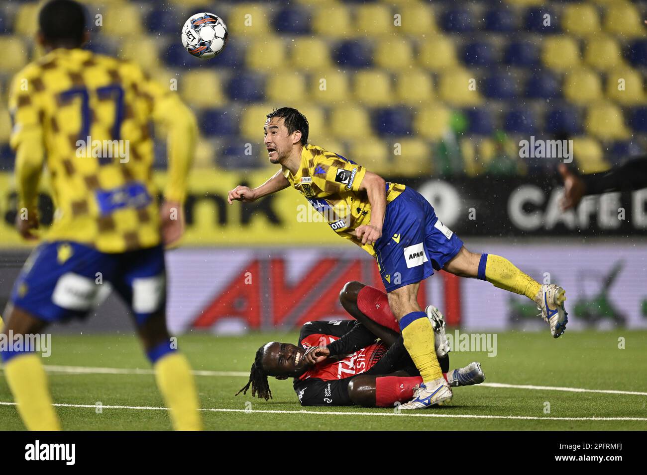 Seraing's Marvin Silver Tshibuabua and STVV's Shinji Okazaki fight for the ball during a soccer match between Sint-Truidense VV and RFC Seraing, Saturday 18 March 2023 in Sint-Truiden, on day 30 of the 2022-2023 'Jupiler Pro League' first division of the Belgian championship. BELGA PHOTO JOHAN EYCKENS Stock Photo