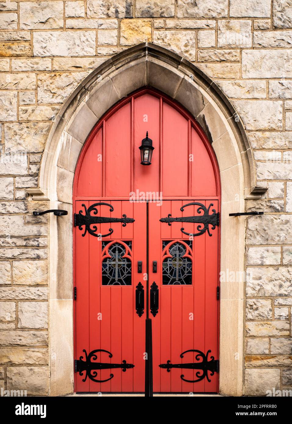 This photo highlights the bold and eyecatching red door of the
