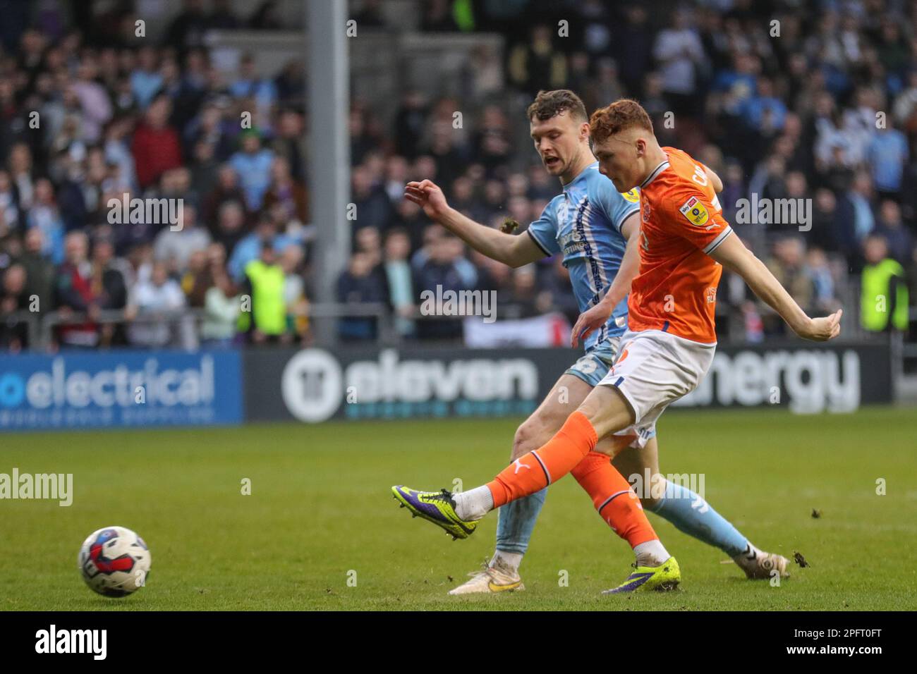 Blackpool, UK. 18th Mar, 2023. Sonny Carey #16 of Blackpool shoots on goal under pressure from Luke McNally #16 of Coventry City during the Sky Bet Championship match Blackpool vs Coventry City at Bloomfield Road, Blackpool, United Kingdom, 18th March 2023 (Photo by Alfie Cosgrove/News Images) in Blackpool, United Kingdom on 3/18/2023. (Photo by Alfie Cosgrove/News Images/Sipa USA) Credit: Sipa USA/Alamy Live News Stock Photo