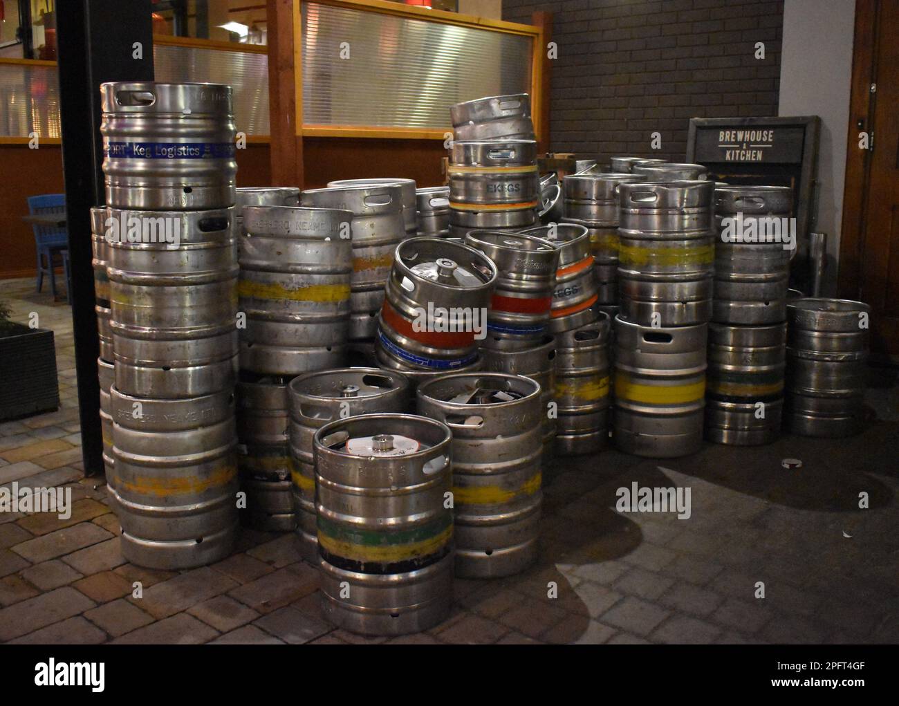 Beer kegs stacked outside a bar at 12th Street in Milton Keynes. Stock Photo