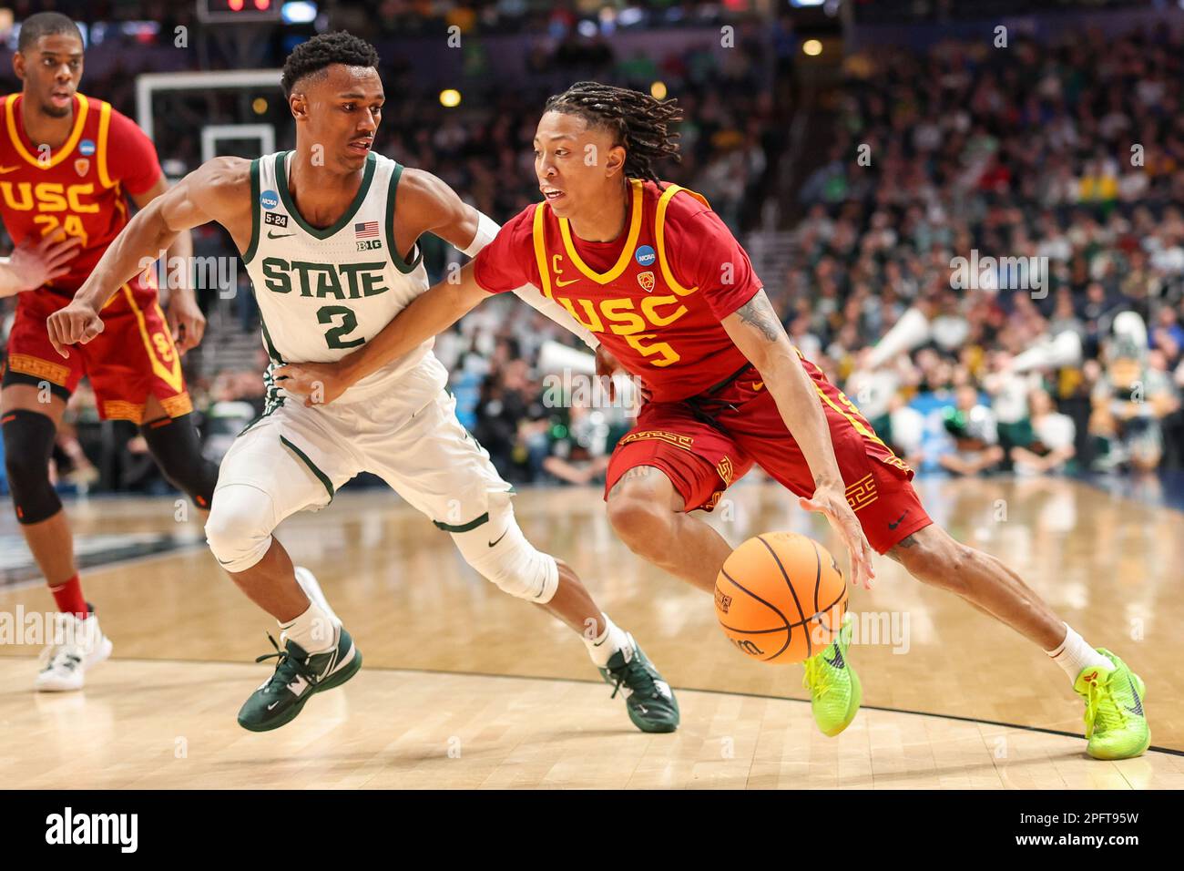 USC Trojans guard Boogie Ellis (5) drives with the ball against Michigan State Spartans guard Tyson Walker (2) during a NCAA Tournament first round game, Friday, Mar. 17, 2023, in Columbus, Ohio. Michigan State defeated USC 72-62. (Scott Stuart/Image of Sport) Stock Photo