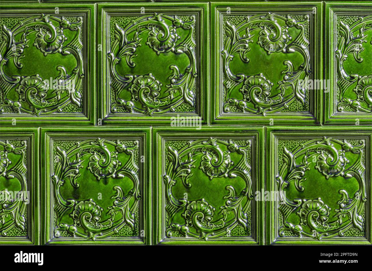 Old green tiled stove Stock Photo