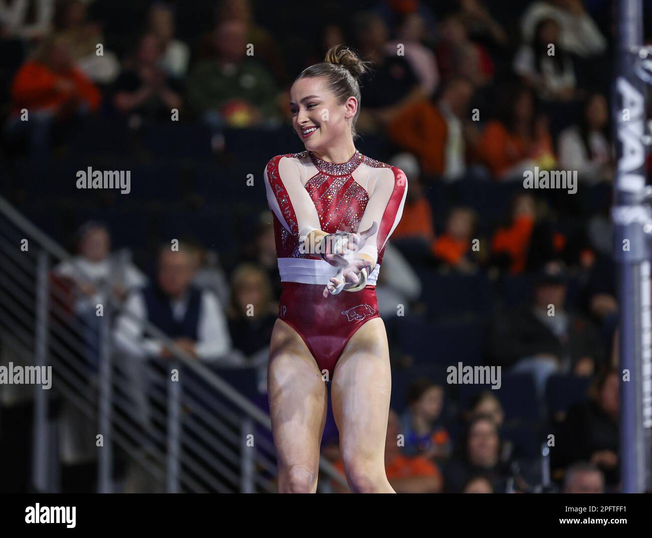 March 18, 2023 Arkansas' Norah Flatley smiles after her bar dismount