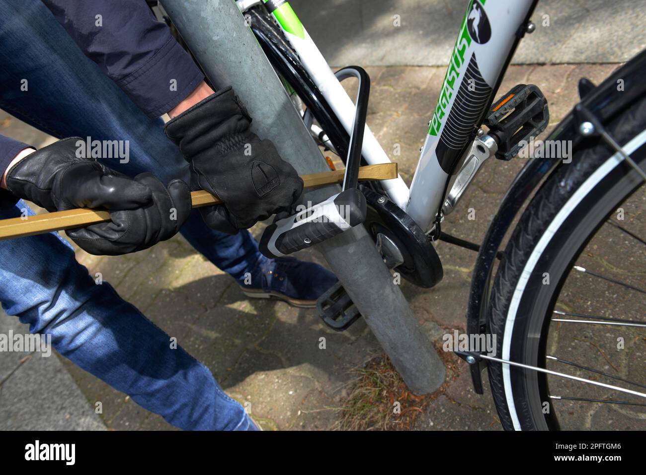 Bicycle thief, symbol photo Stock Photo - Alamy