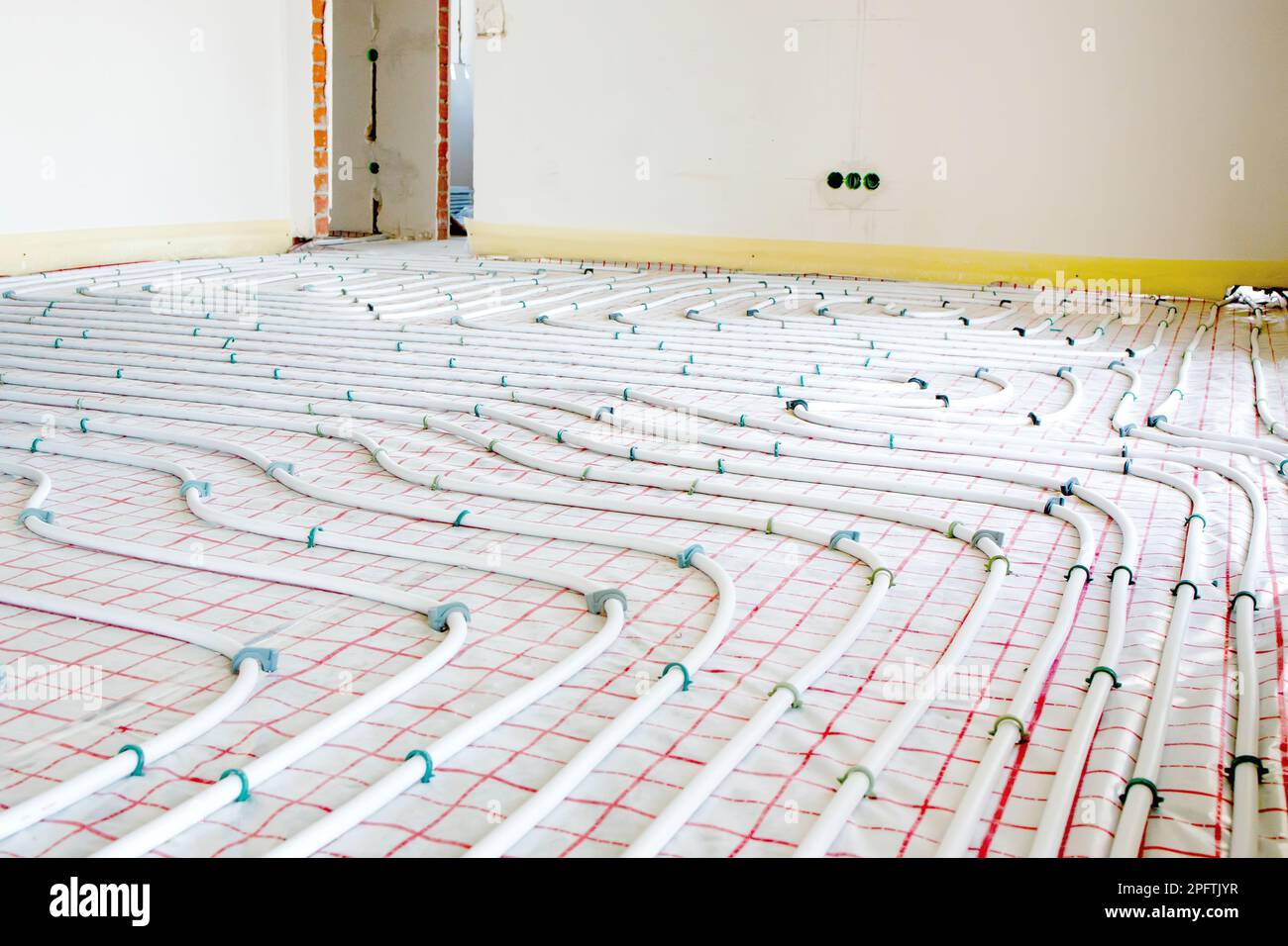 Installation of underfloor heating pipes for water heating. Heating