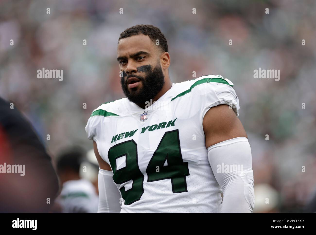 FILE - New York Jets defensive end Joe Klecko gets a hold on the shirt of  New York Giants quarterback Phil Simms during the first quarter of Sunday's  26-7 Jets win in