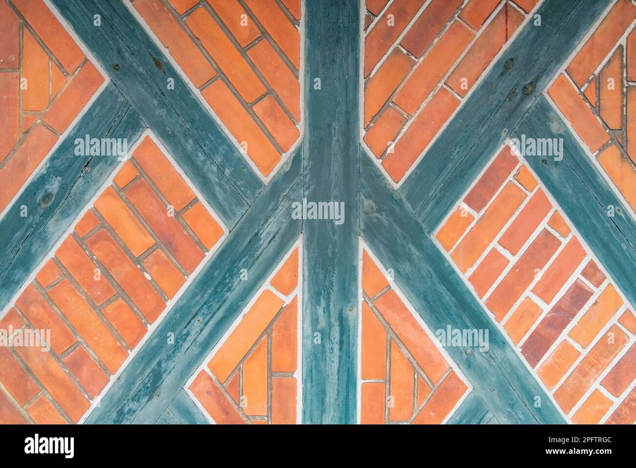 Brick Wall with wooden beams as a texture or background Stock Photo - Alamy