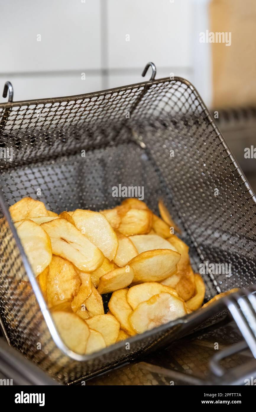 Delicious yellow french fries made from fresh potatoes and fried in