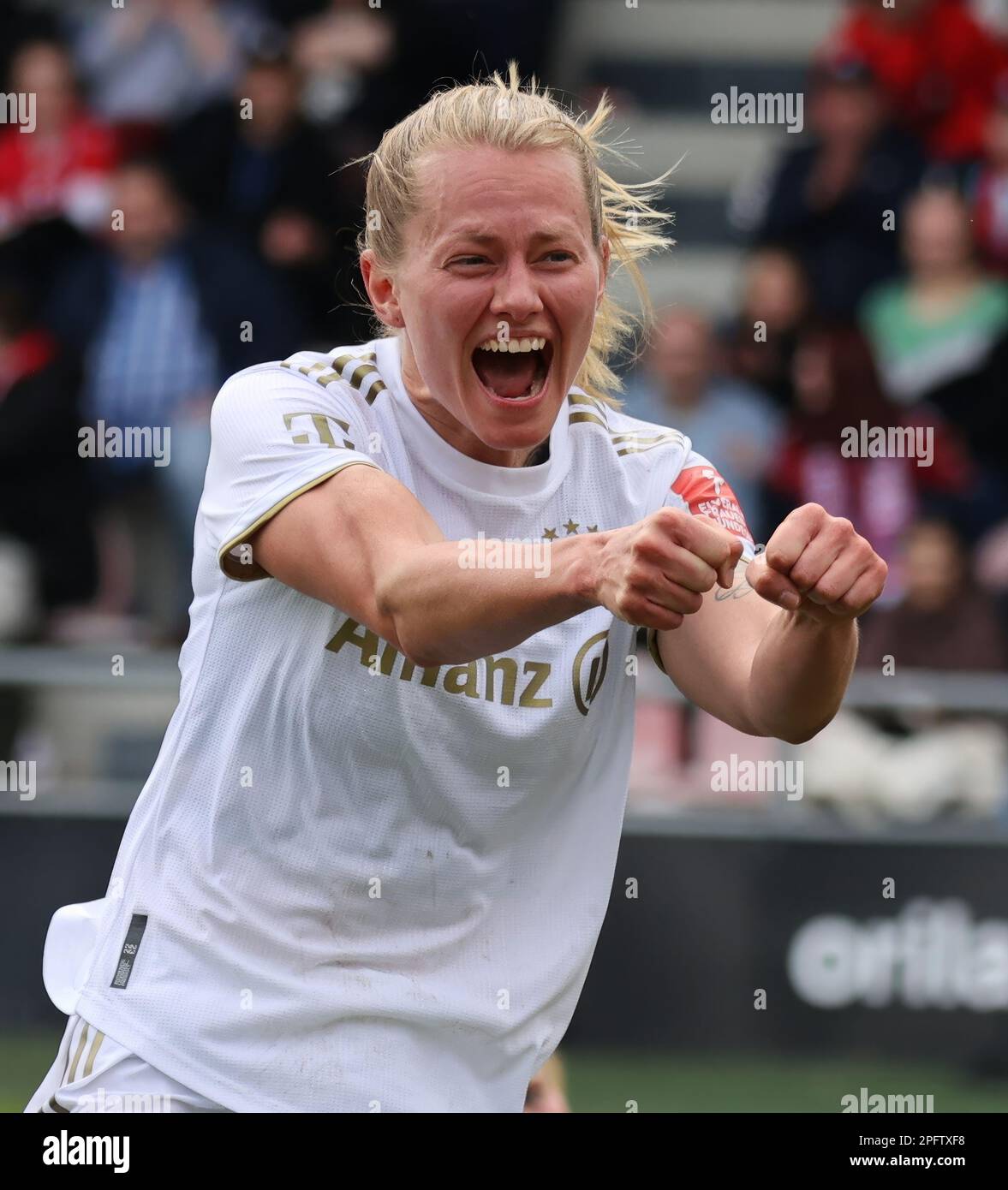 Bayern's Giulia Gwinn heads the ball during the women's quarterfinal Champions  League first leg soccer match between Bayern Munich and Paris Saint-Germain  in Munich, Germany, Tuesday, March 22, 2022. (AP Photo/Matthias Schrader