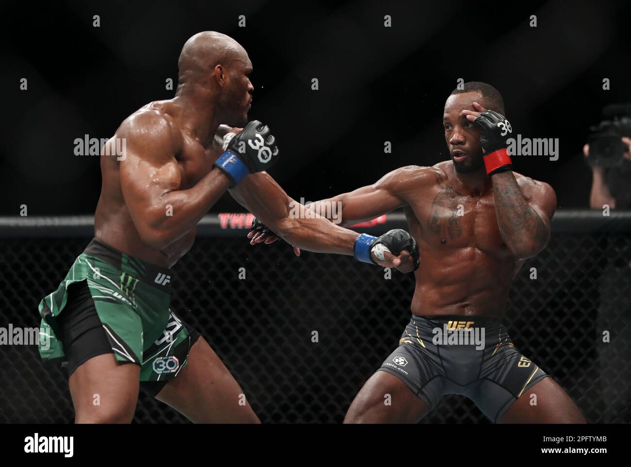 Leon Edwards (right) in action against Kamaru Usman during their