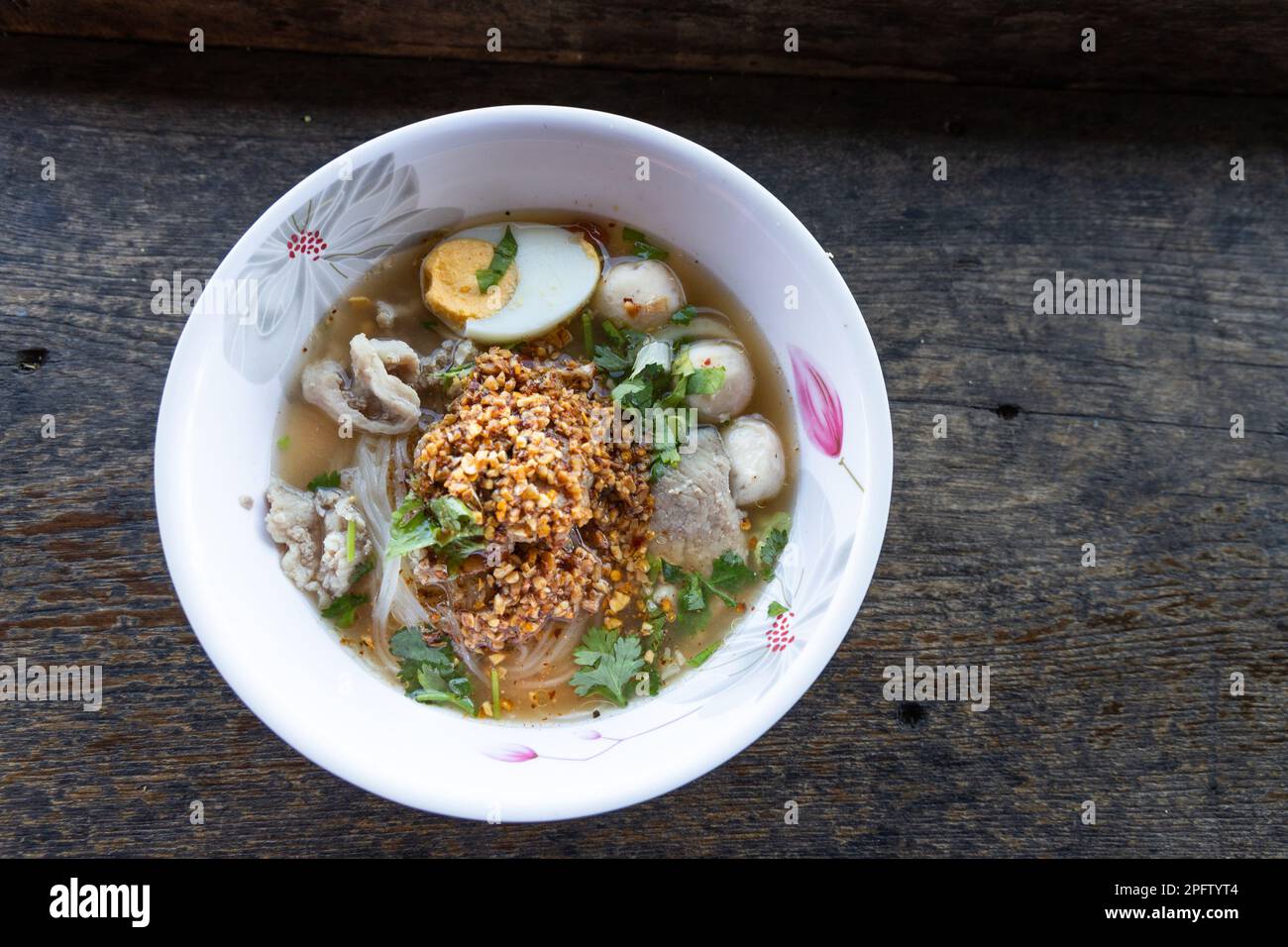 Overhead view of popular Jabo noodles in Ban Jabo, Thailand made up fo noodles with hard boild