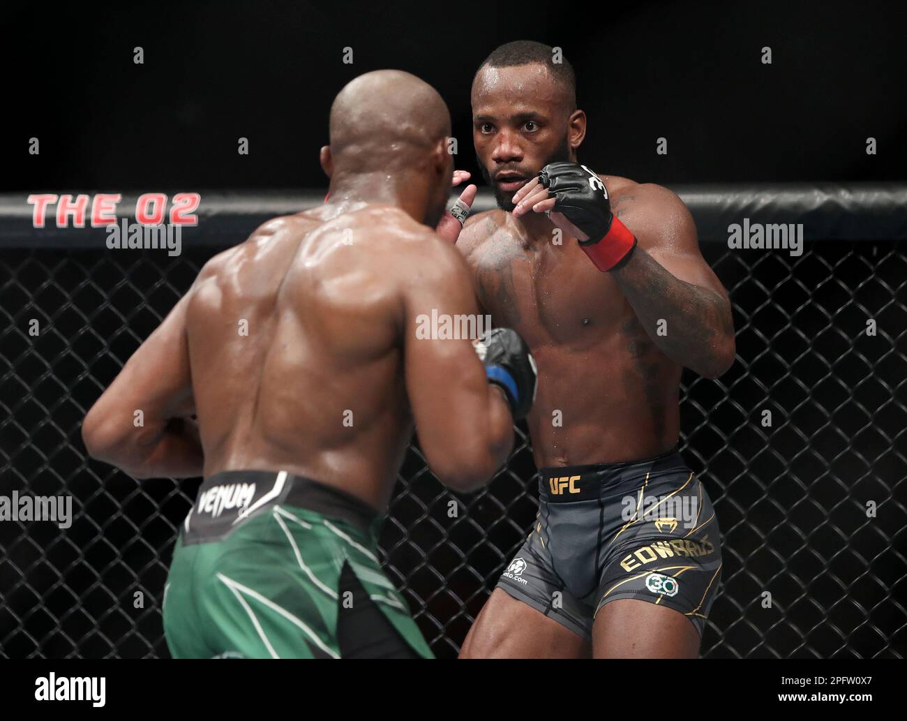 Leon Edwards (right) In Action Against Kamaru Usman During Their ...