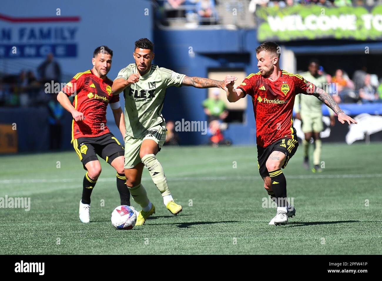 March 18, 2023: Los Angeles FC forward Denis Bouanga (99) battles Seattle Sounders midfielder Alex Roldan (16) during the MLS soccer match between Los Angeles FC and Seattle Sounders FC at Lumen Field in Seattle, WA. The teams ended at a nil-nil draw. Steve Faber/CSM Stock Photo