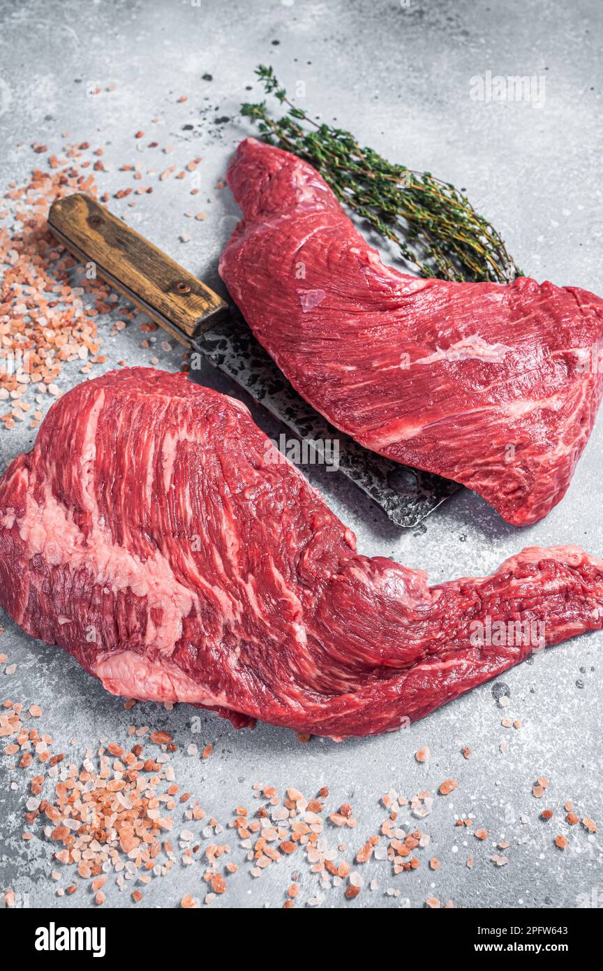 Unccoked tri-tip triangle roast, raw bottom sirloin steak on buther ...