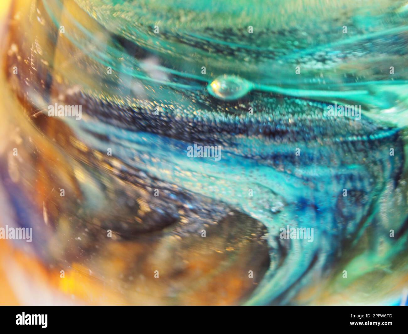 Hand blown multicolored glass macro abstract Stock Photo