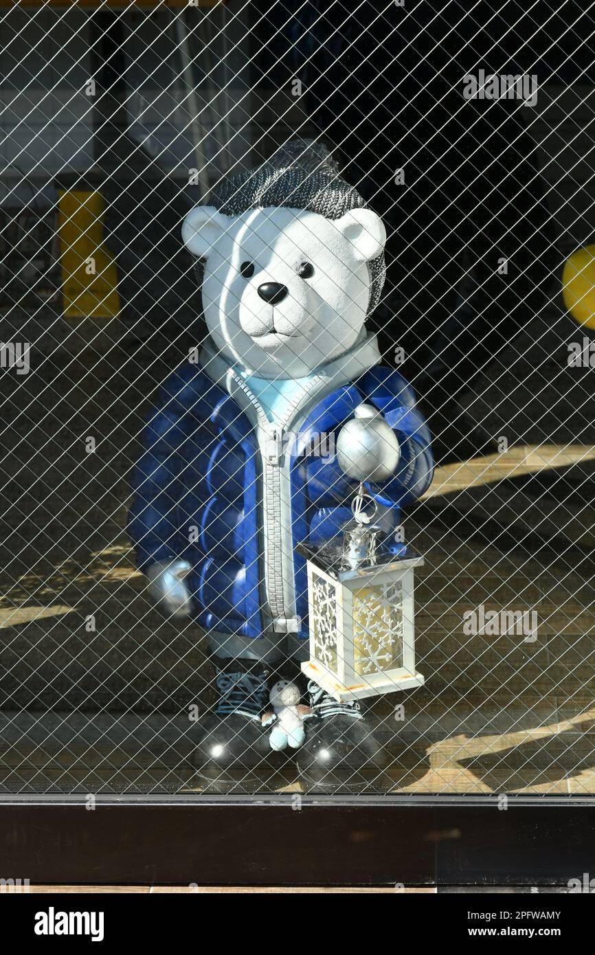 The bear statue holding a lamp Stock Photo Alamy