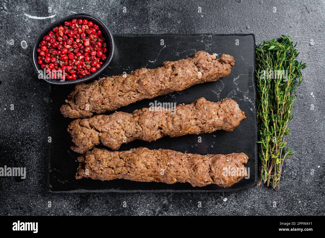 Grilled Shish kebab on a stick, from ground beef and lamb meat, turkish