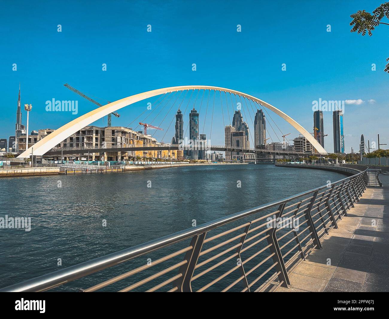 Dubai Water Canal Tolerance Bridge, pedestrian bridge with water taxi