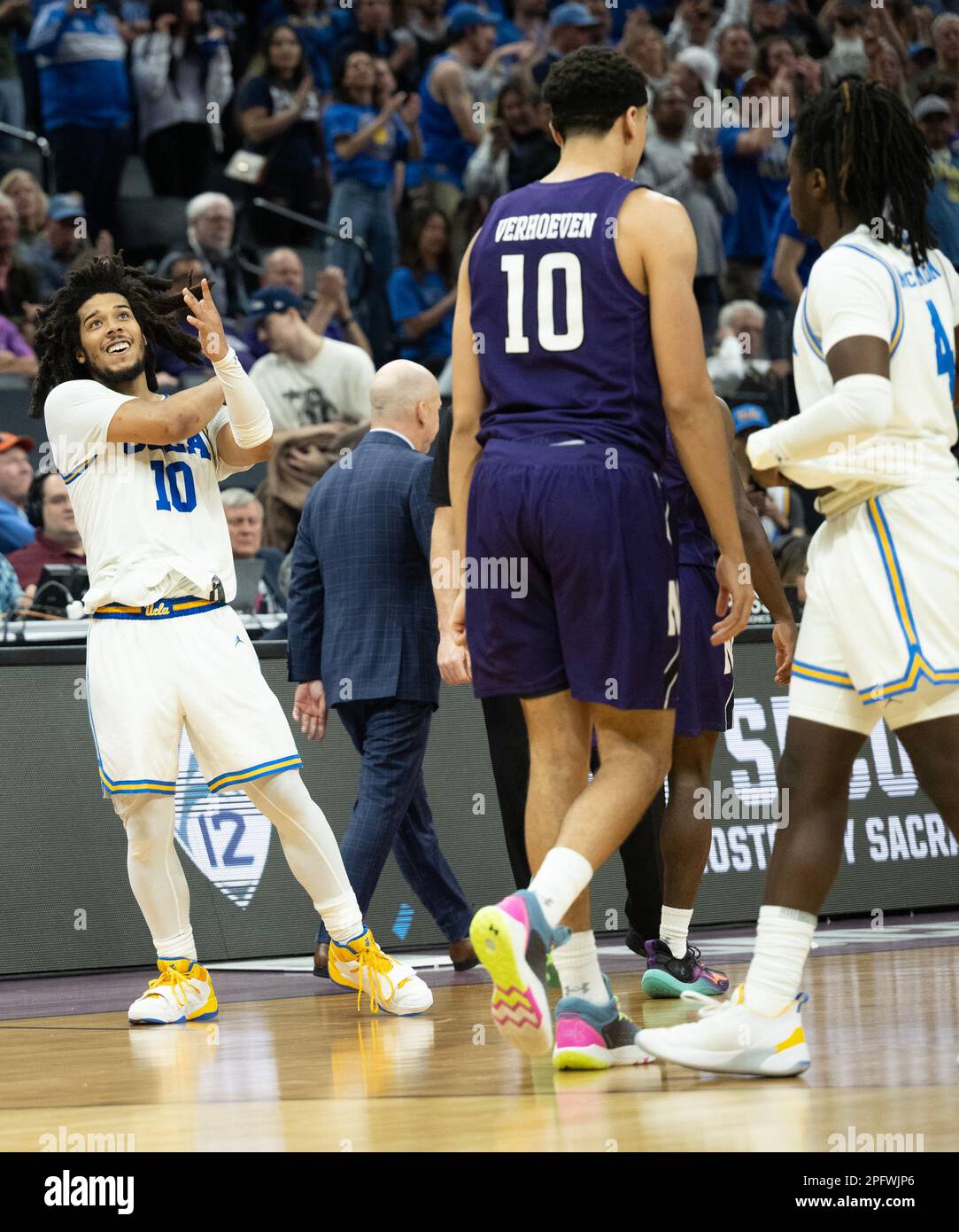 Sacramento, CA, USA. 18th Mar, 2023. UCLA Bruins guard Tyger Campbell (10) reacts after beating Northwestern Wildcats 68-63 in the NCAA Tournament at Golden 1 Center in Sacramento, Saturday, March 18, 2023. Princeton Tigers beat the Missouri Tigers 78-63. (Credit Image: © Paul Kitagaki Jr./ZUMA Press Wire) EDITORIAL USAGE ONLY! Not for Commercial USAGE! Stock Photo